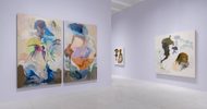 A gallery with light purple walls displays abstract paintings featuring organic shapes and muted colors. Three large canvases hang on adjacent walls, with subtle lighting and a polished floor reflecting the artwork.
