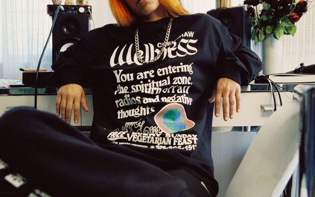 Image of model wearing graphic tshirt